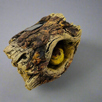 Solar-Powered Tree Trunk with Birdhouse and LED Light